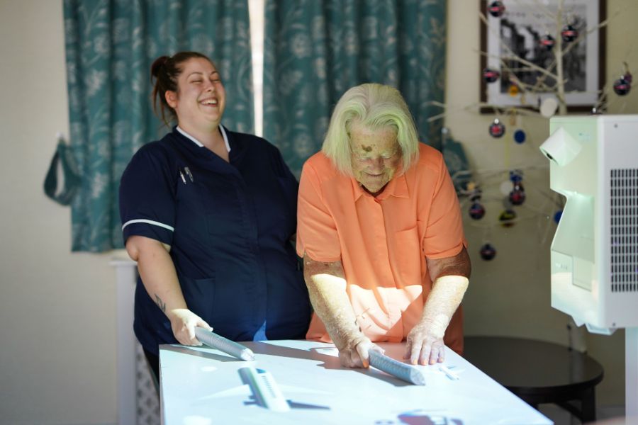 Dementia care team in Rochester with arts and craft activities for dementia residents